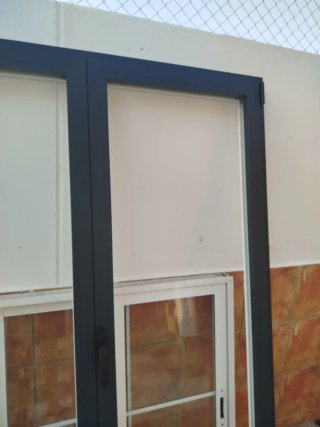 Puerta Oscilobatiente Doble Hoja