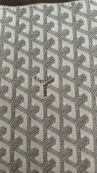 Pochette Goyard uomo bianca