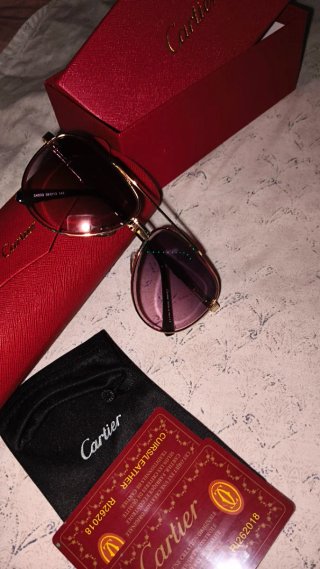 Gafas de sol Cartier doradas y rosas