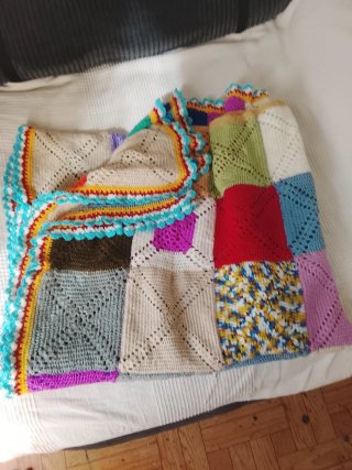 Colcha tejida a mano multicolor