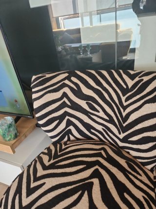 Butaca de tela con estampado de cebra