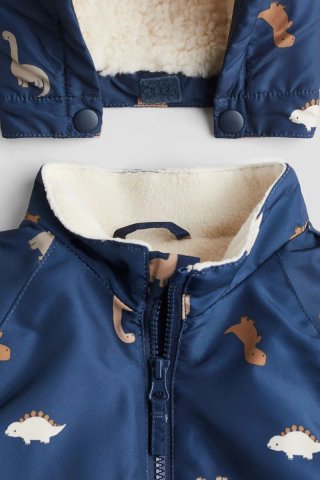 Buzo - mono impermeable bebé dinosaurios