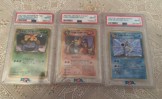 Dark Charizard Dark Blastoise y Dark venusaur PSA8