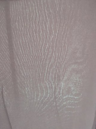 Camiseta morada con mangas acampanadas