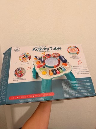 Mesa de actividades musical para bebés