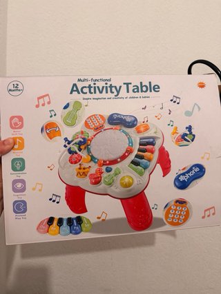 Mesa de actividades musical para bebés