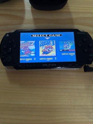 Pacchetto Sony PSP-1004 con Scatola Originale + 10 Giochi
