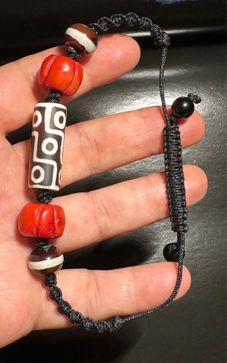 Pulsera Dzi 9 Ojos Roja y Marrón