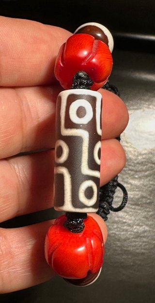Pulsera Dzi 9 Ojos Roja y Marrón