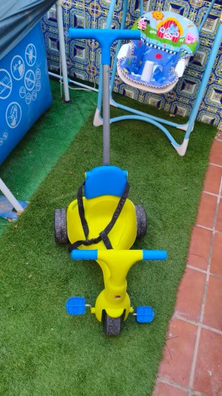 Triciclo evolutivo amarillo y azul