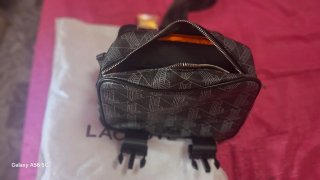 Bandolera Lacoste nueva