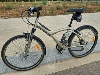Bicicleta de paseo b'Twin seven. Doble suspension.