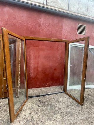 Puerta pvc roble dos hojas abatibles