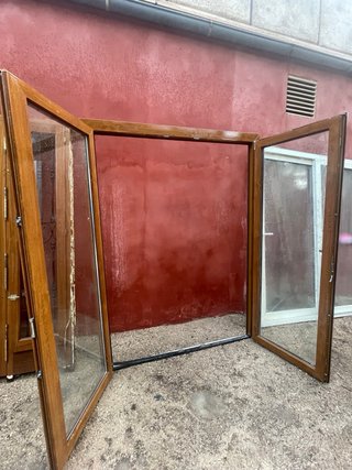Puerta pvc roble dos hojas abatibles