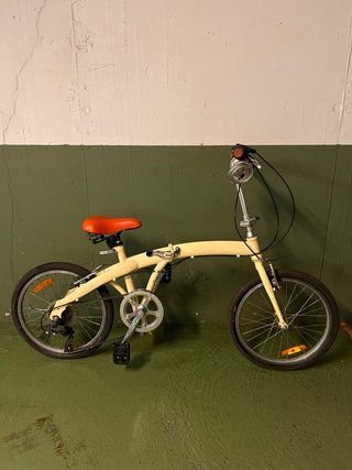 Bicicleta plegable vintage color crema