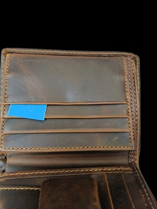 Cartera de cuero con diseño de barco pirata