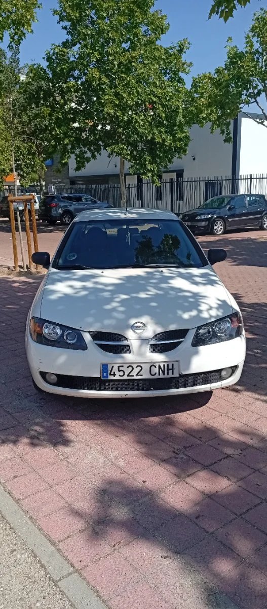 Nissan Almera 2003 - foto 1