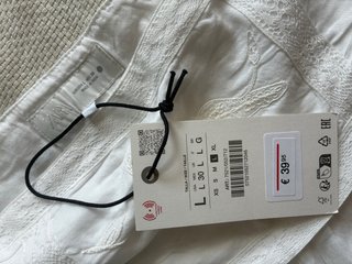 Pantalón Zara blanco pierna ancha encaje