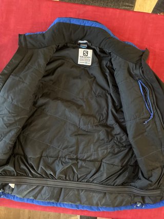 Chaqueta Salomon Negra y Azul con capucha extraibl