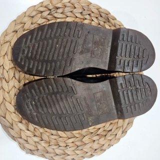 Mocasines Dr. Martens negros con flecos