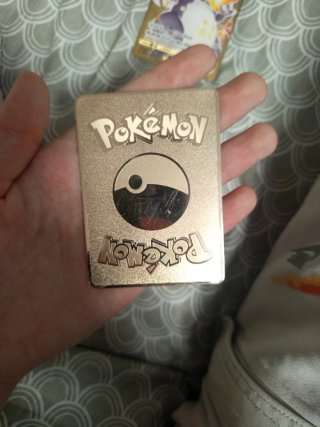 Carta Pokémon Charizard VMAX Metalica Dorada