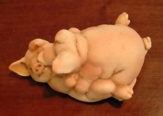 Statuetta vintage maialini giocosi