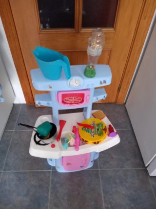 Carrito de compras infantil rojo y rosa