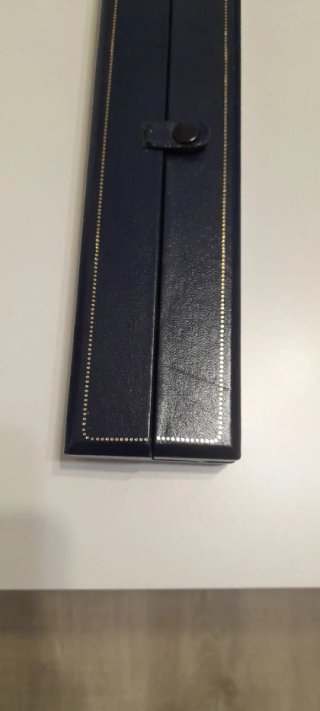 Estuche para reloj azul y dorado
