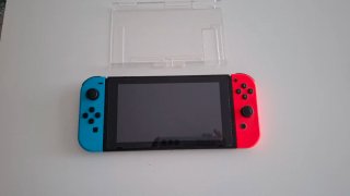 Nintendo Switch Azul/Rojo con funda y accesorios