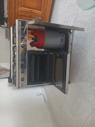 OPORTUNIDAD. Cocina 5 fuegos y horno butano/propan