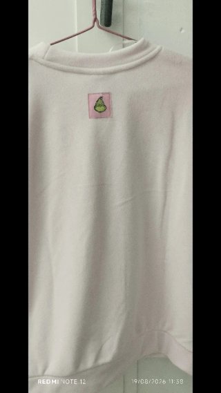 Sudadera Grinch con lazo rosa