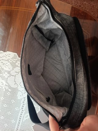Bolso bandolera Kipling gris.