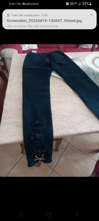 Pantaloni donna neri con fiocchi