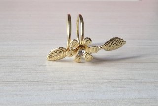 Anello regolabile fiore foglia color oro