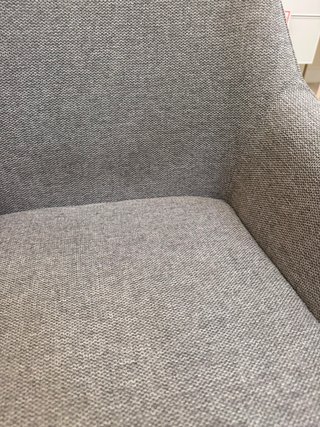Butaca tapizada gris