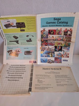 Manuales Sega Master System II en mal estado