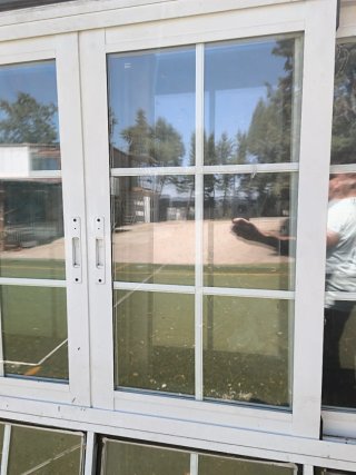 Ventana corredera 4 hojas con palillería