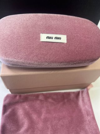 Gafas Miu Miu Ovaladas Sin Montura Doradas