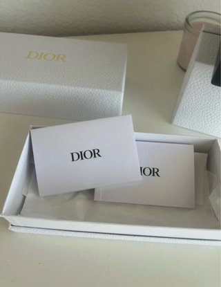 Cajas de gafas Dior y Prada