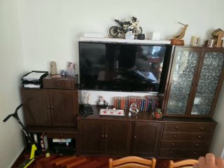 Mueble modular salón madera oscura