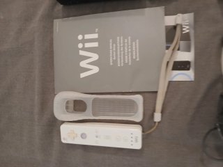 Nintendo Wii con mandos y juegos