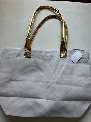 Bolsa de playa beige y dorada