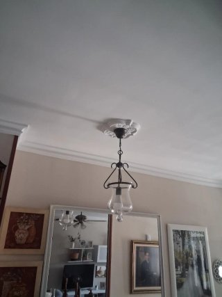 Lámpara colgante de metal y cristal