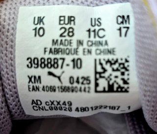 Zapatilla deportiva niña Puma morado/blanco. T 28
