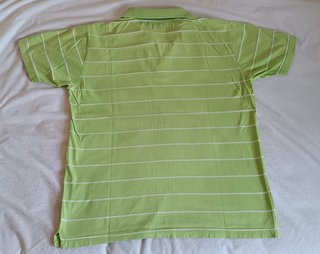 Polo Lacoste verde con rayas blancas