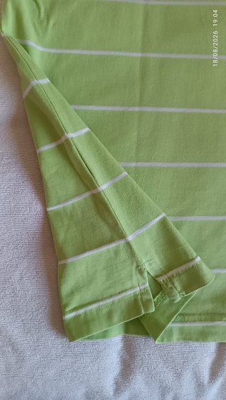 Polo Lacoste verde con rayas blancas