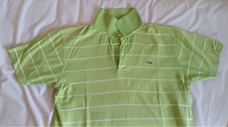 Polo Lacoste verde con rayas blancas