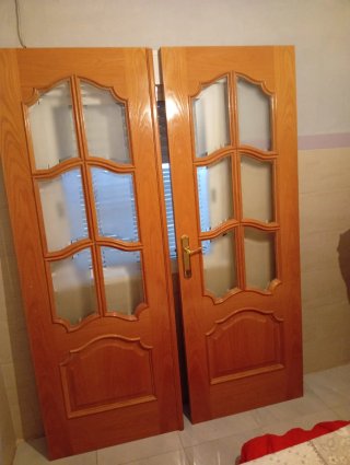 Puertas de salón de madera con cristal