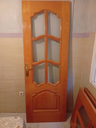 Puertas de salón de madera con cristal