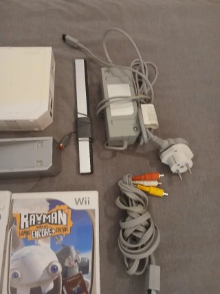 Consola Nintendo Wii con Mando y Juegos